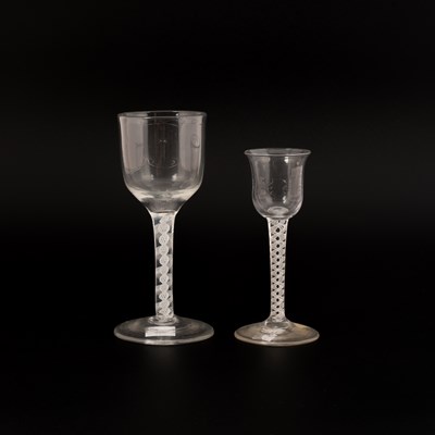Lot 846 - Two English double series opaque twist wine glasses