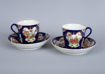 Lot 773 - A pair of Worcester blue scale ground coffee cans and saucers