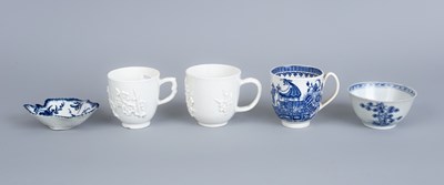 Lot 790 - Two Bow white porcelain coffee cups with prunus sprigs