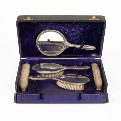 Lot 37 - A silver-backed dressing set