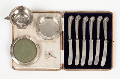 Lot 38 - A miniature silver funnel