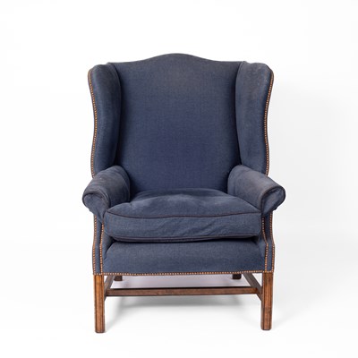 Lot 393 - A George III style wingback armchair