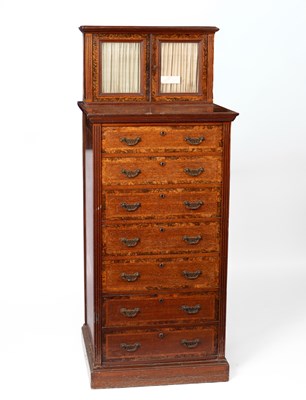Lot 397 - A walnut and figured walnut Wellington chest by Holland & Sons