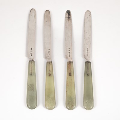 Lot 39 - A set of four George III knives