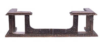 Lot 688 - A Victorian carved oak club fender