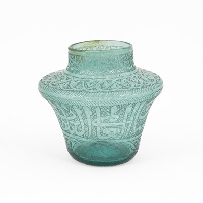 Lot 860 - An Islamic glass vase