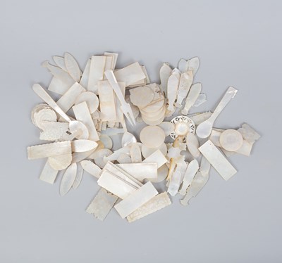 Lot 606 - A collection of approximately one hundred mother-of-pearl gaming tokens