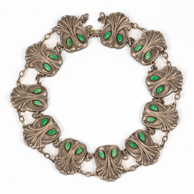 Lot 22 - An Art Nouveau white metal and green glass part belt