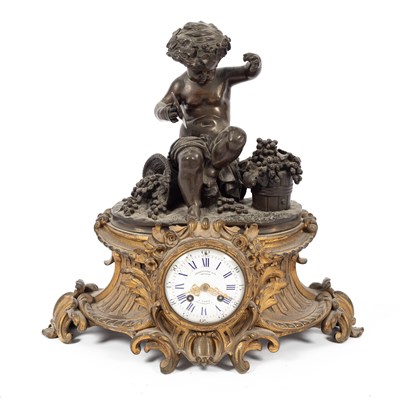 Lot 252 - A French bronze and gilt-metal mounted mantel clock