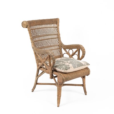 Lot 412 - A painted wicker armchair