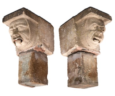 Lot 438 - Two carved stone gargoyles