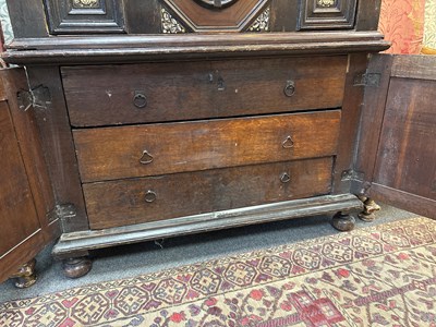 Lot 654 - A Commonwealth oak, ebonised and inlaid enclosed chest of drawers