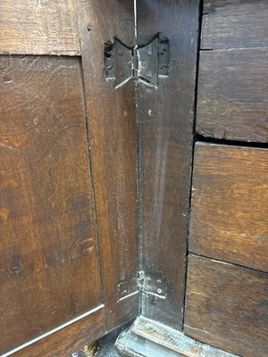 Lot 654 - A Commonwealth oak, ebonised and inlaid enclosed chest of drawers