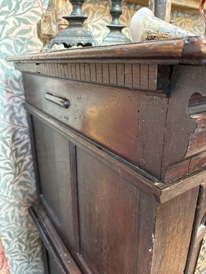 Lot 654 - A Commonwealth oak, ebonised and inlaid enclosed chest of drawers