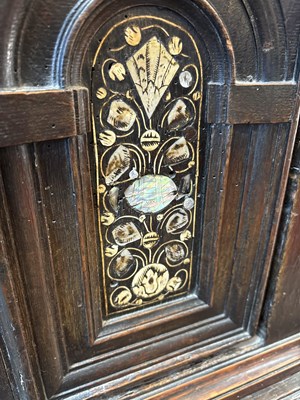 Lot 654 - A Commonwealth oak, ebonised and inlaid enclosed chest of drawers