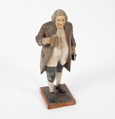 Lot 698 - A plaster figure of a gentleman