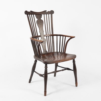Lot 647 - A George III comb-back Windsor armchair