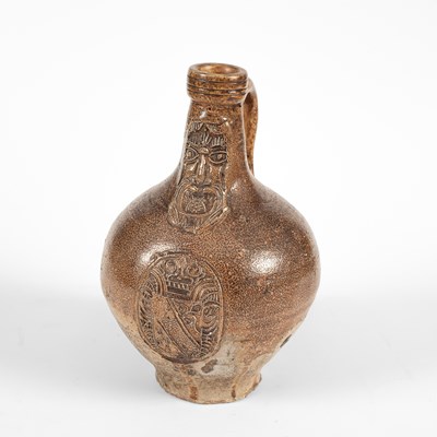 Lot 802 - A Rhenish salt-glazed stoneware armorial Bartmann jug or Bellarmine