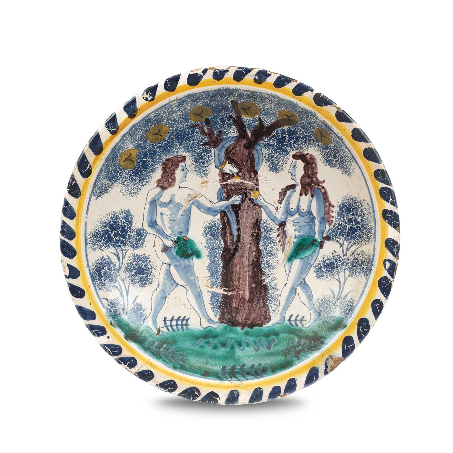 Lot 717 - An English Delftware Adam & Eve blue dash charger