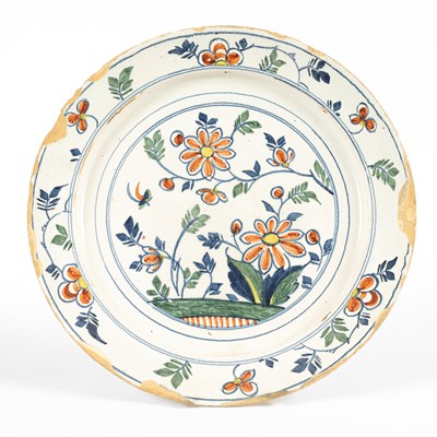 Lot 720 - A Bristol Delftware polychrome charger
