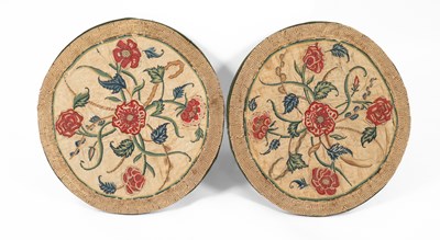 Lot 695 - A pair of oval embroidered panels