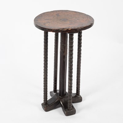 Lot 640 - A small oak circular table/candle stand