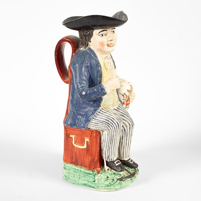 Lot 728 - An American Sailor Toby jug