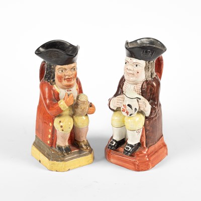 Lot 735 - Two small Staffordshire Toby jugs