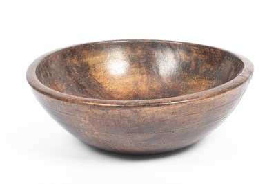 Lot 700 - A large beech dairy bowl