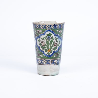 Lot 610 - An Islamic style ceramic vase