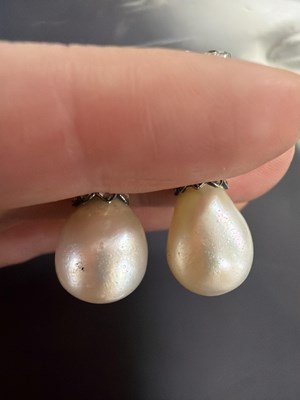 Lot 20 - A pair of 19th Century natural pearl and diamond drop earrings