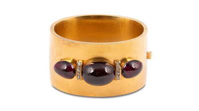 Lot 11 - A Victorian garnet and diamond set cuff bangle