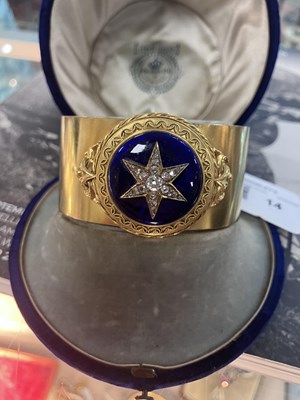 Lot 14 - A Victorian diamond and enamel memorial cuff bangle