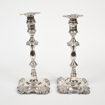 Lot 44 - A pair of 18th Century style silver candlesticks