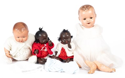 Lot 297 - Two black composition baby dolls
