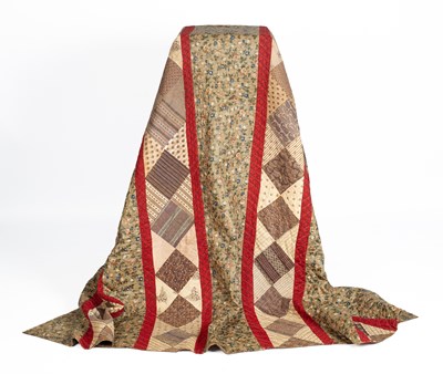 Lot 292 - A Victorian patchwork quilt/ bedcover