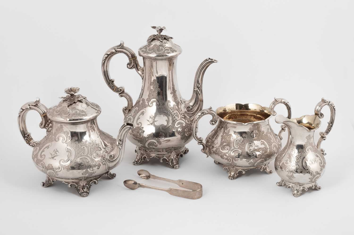 Lot 52 - A Victorian silver and silver-gilt four-piece tea and coffee service