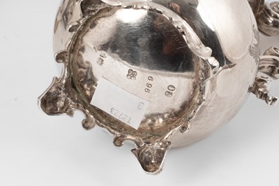 Lot 52 - A Victorian silver and silver-gilt four-piece tea and coffee service
