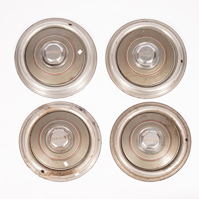 Lot 253 - Four Bentley hubcaps