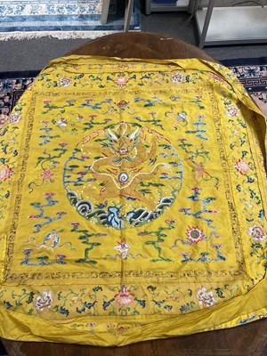 Lot 589 - A Chinese Imperial yellow ground silk and metal thread cover