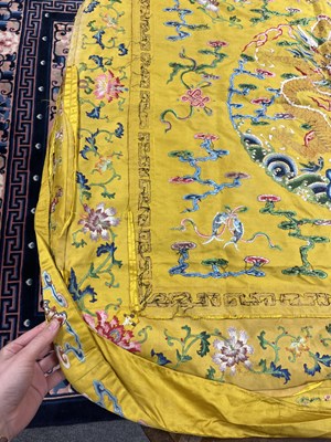 Lot 589 - A Chinese Imperial yellow ground silk and metal thread cover