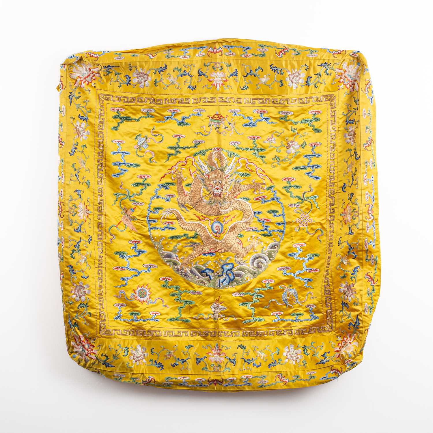 Lot 589 - A Chinese Imperial yellow ground silk and metal thread cover
