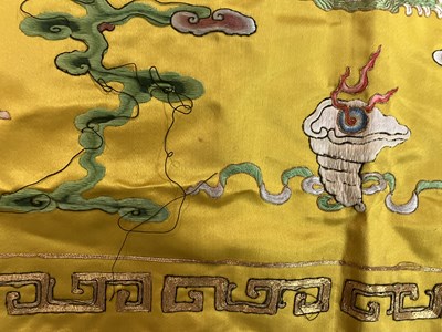 Lot 589 - A Chinese Imperial yellow ground silk and metal thread cover