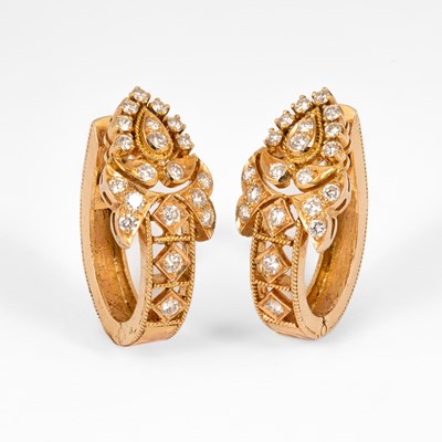 Lot 185 - A pair of yellow metal and diamond earrings