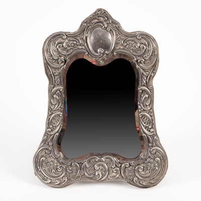 Lot 80 - A late Victorian silver mounted mirror