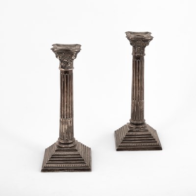 Lot 56 - A pair of silver candlesticks