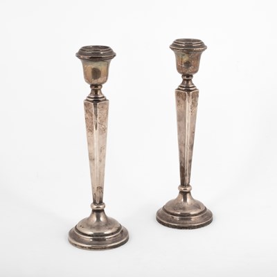 Lot 58 - A pair of silver candlesticks