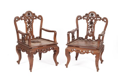 Lot 820 - A pair of Chinese carved wooden open armchairs