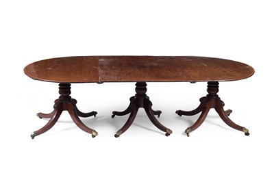Lot 821 - A mahogany and inlaid triple-pedestal dining table