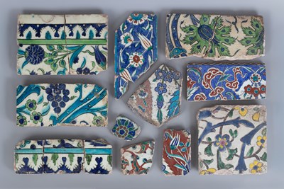 Lot 571 - A quantity of broken Iznik tiles